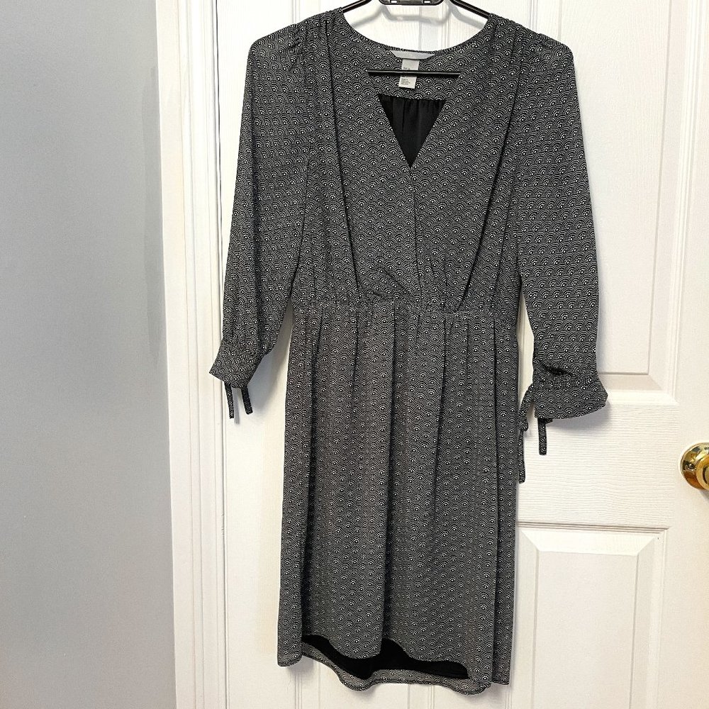 Dress with tie sleeves